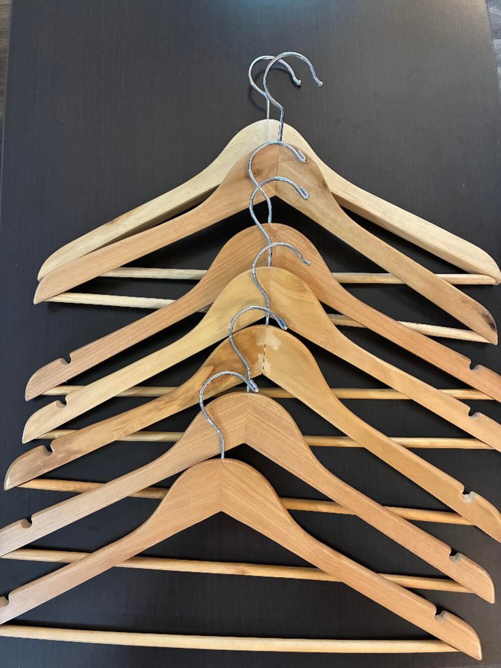 EUC seven wooden clothes hangers